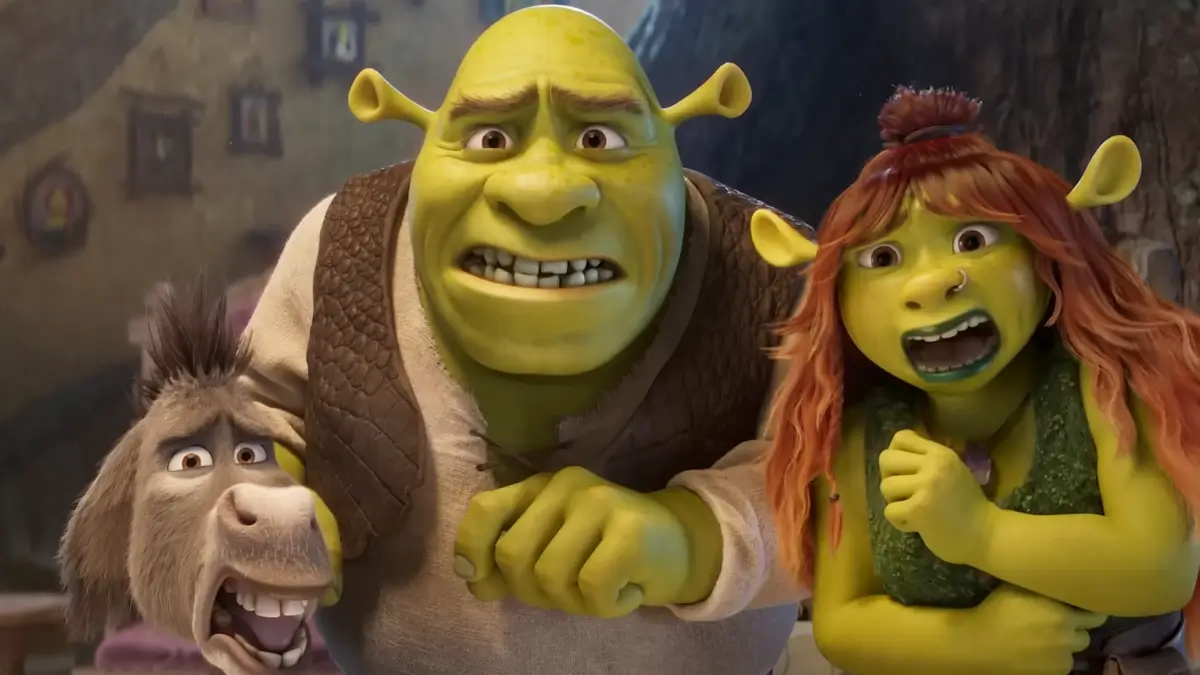 Shrek, Donkey, and Fiona react in shock in a scene from the Shrek 5 teaser, rendered with DreamWorks MoonRay technology showing updated character visuals compared to earlier films.