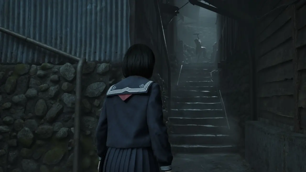 A gameplay screenshot from Silent Hill F showing the tense atmosphere that critics and players are praising, as the protagonist watches a monster at the top of a foggy stairway.